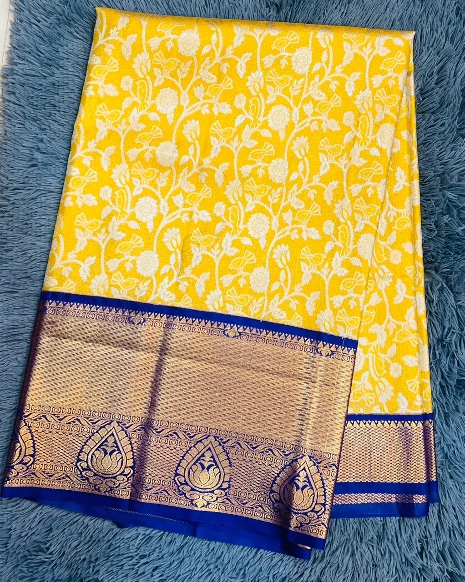 Yellow Colour Body With Woven Floral Motifs In White And Silver/Grey Tones Semi Kanchipattu Saree