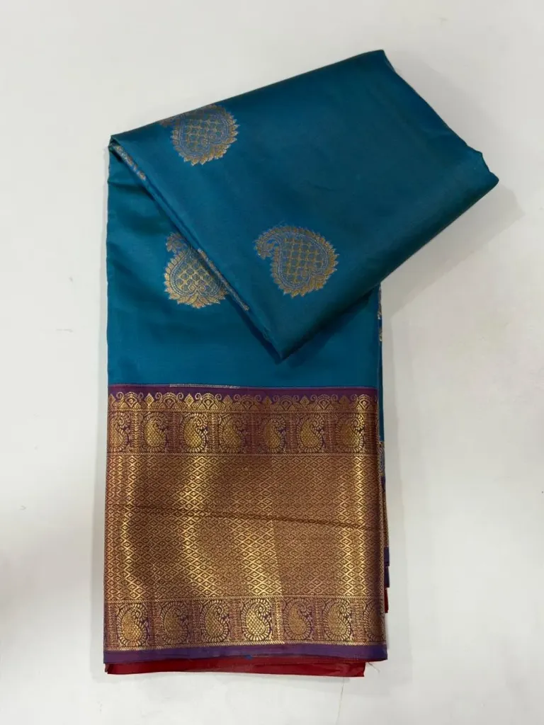 VV1250 Peacock Blue Body With Gold Zari Border Kanchi Soft Silk Saree